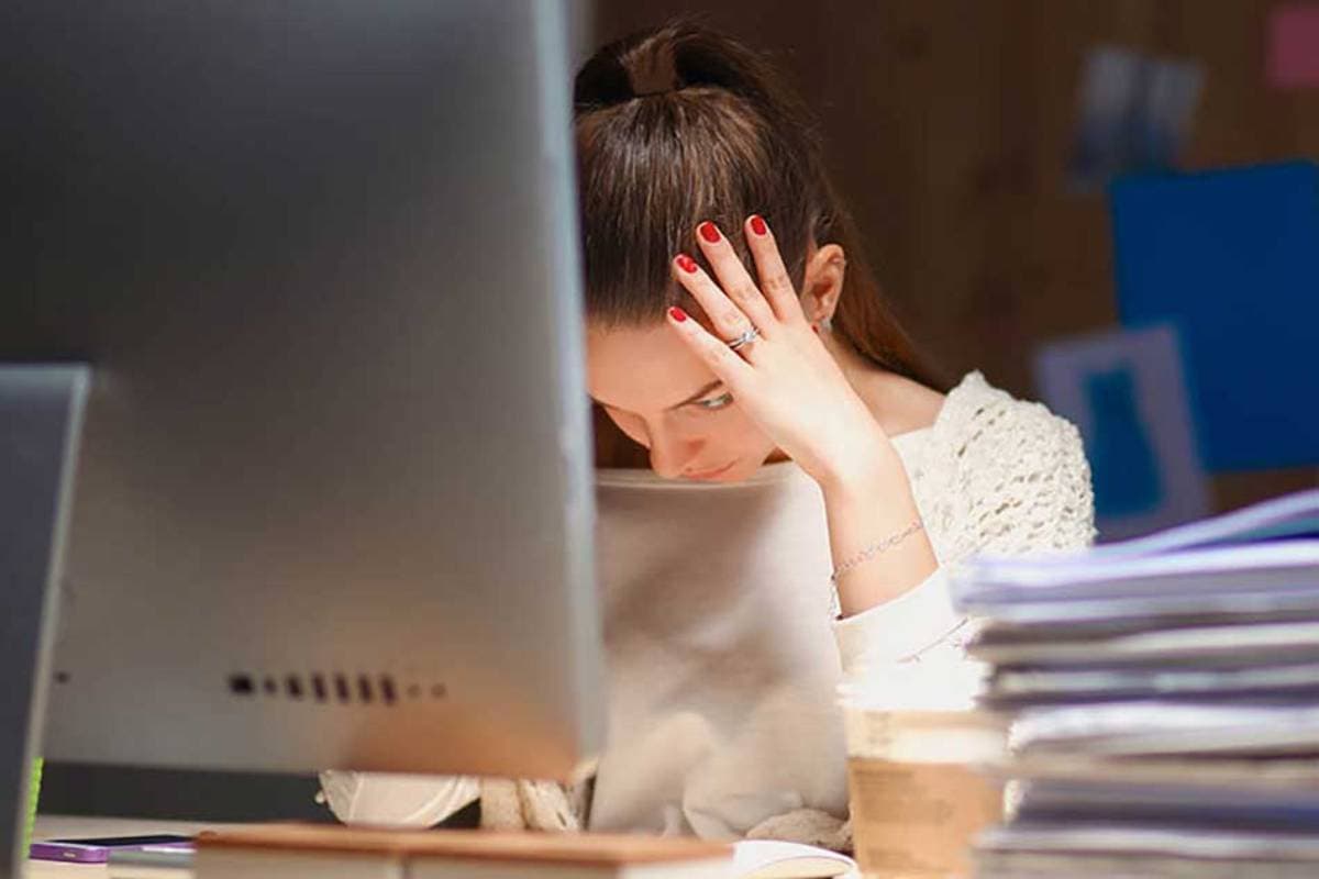 Woman stressed at desk