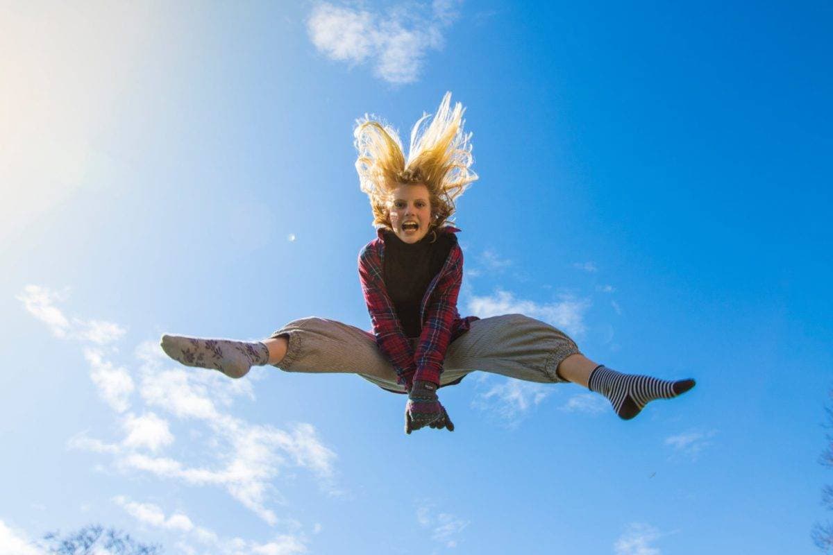 Girl doing a split mid-air