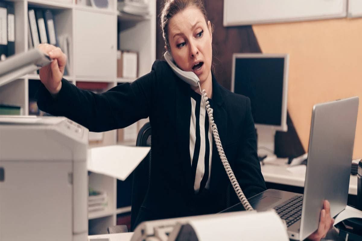 Woman on the phone looking stressed