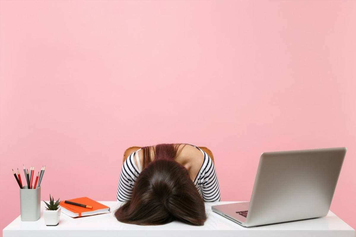 Woman face down on a table