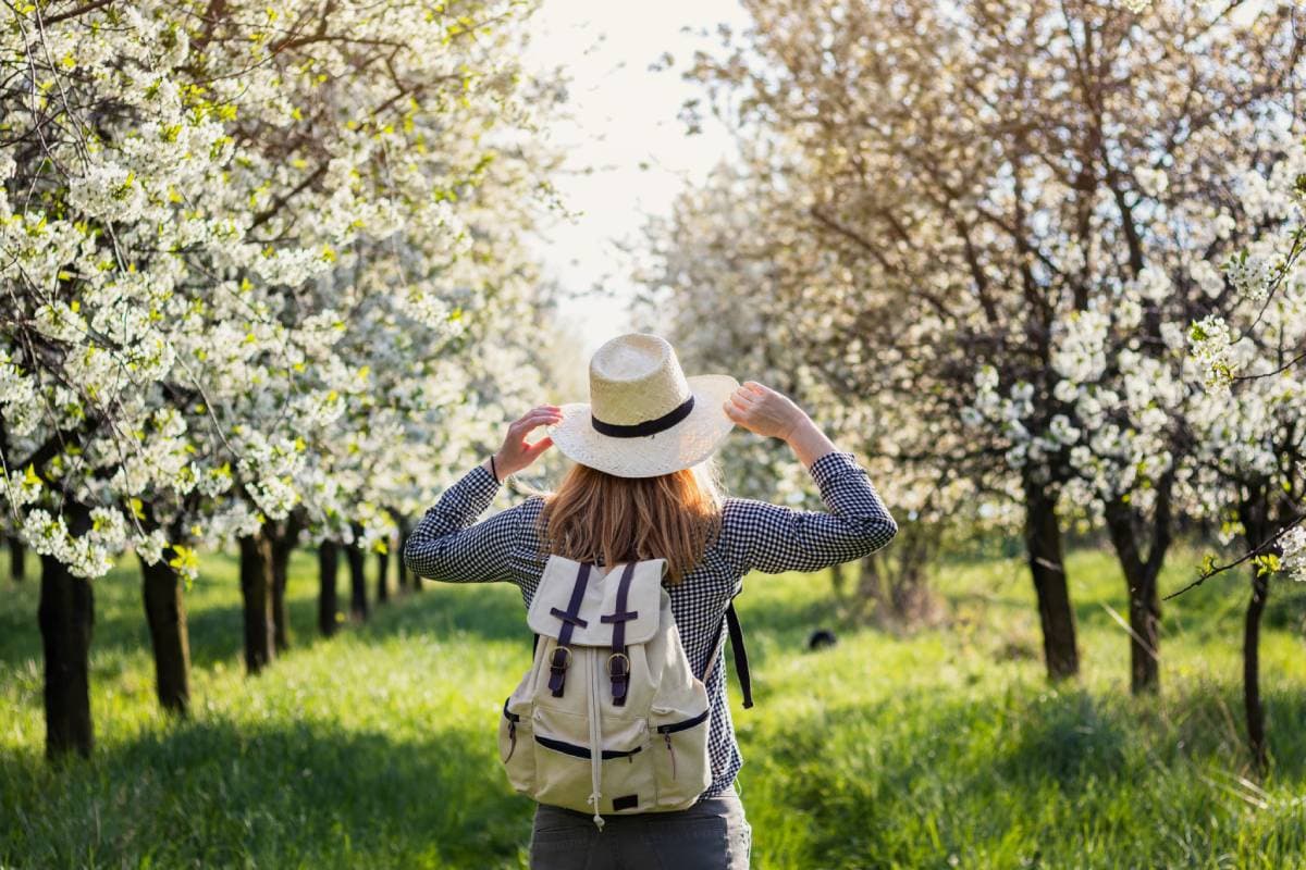 Woman walking in the woods