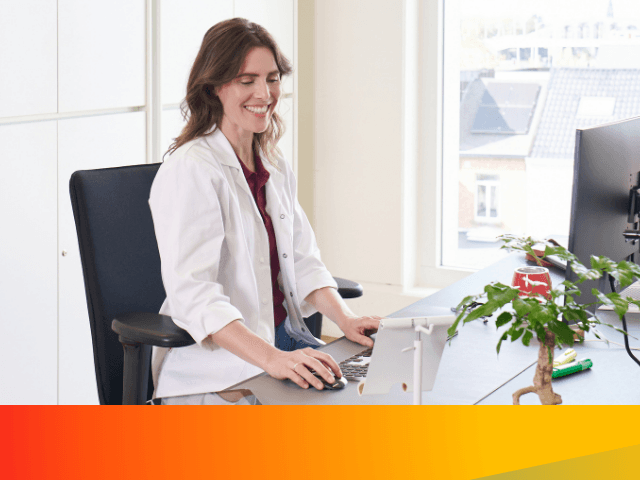 Woman at desk with computer